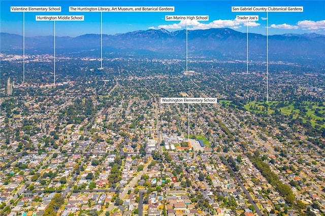 drone / aerial view featuring a mountain view