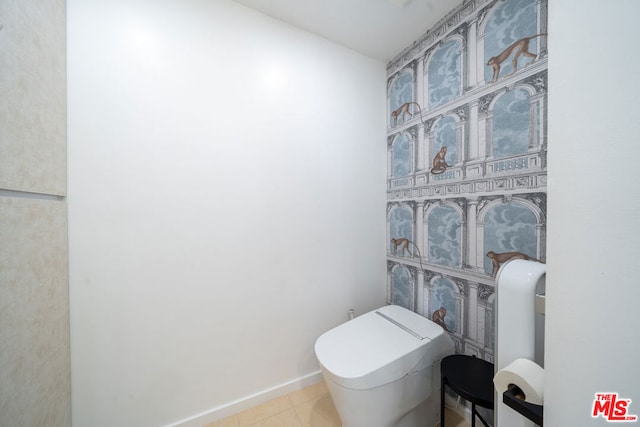 bathroom with tile patterned floors