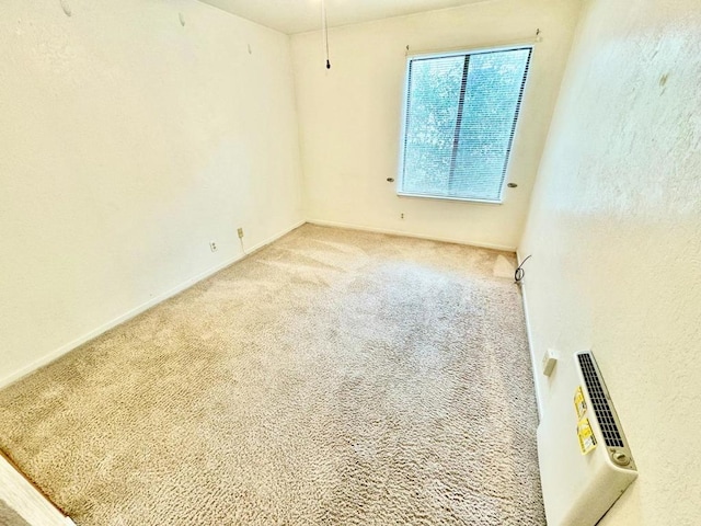 unfurnished room featuring carpet floors