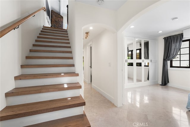 1165 Noria St, Laguna Beach, CA 92651 - stairs with arched walkways, recessed lighting, tile patterned floors, and baseboards