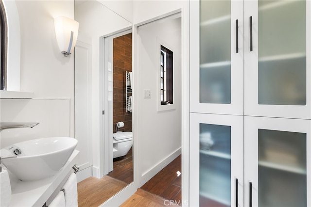 1165 Noria St, Laguna Beach, CA 92651 - bathroom featuring toilet, vanity, and wood finished floors