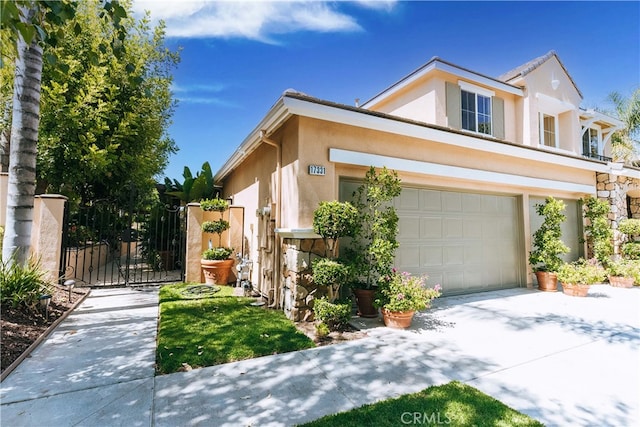 view of front of property featuring a garage