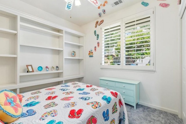 carpeted bedroom featuring ceiling fan