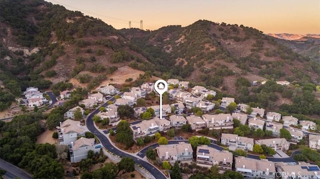 aerial view at dusk with a mountain view