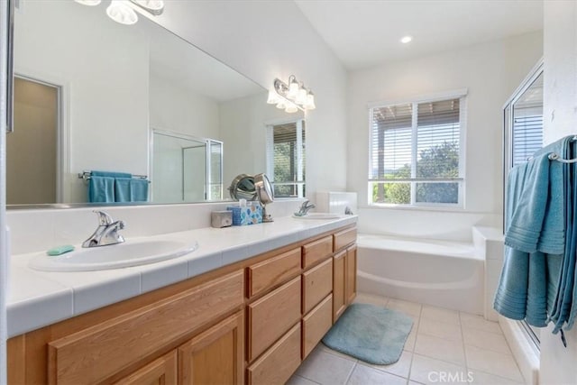 bathroom featuring vanity, tile patterned floors, and independent shower and bath