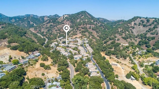 bird's eye view with a mountain view