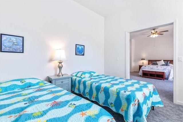 bedroom featuring ceiling fan and carpet floors