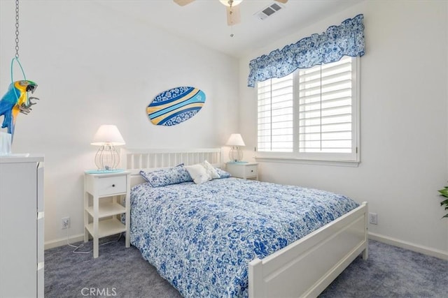 bedroom with dark carpet and ceiling fan