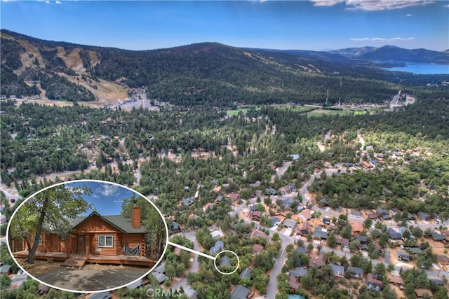 bird's eye view with a mountain view