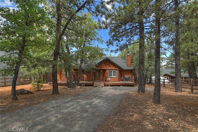 log home with a deck