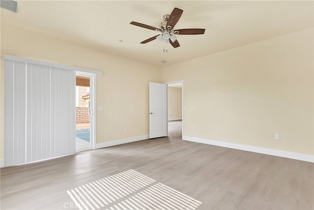 unfurnished room featuring light wood-type flooring and ceiling fan