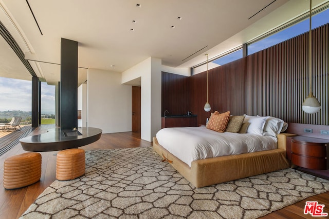 bedroom with wood-type flooring