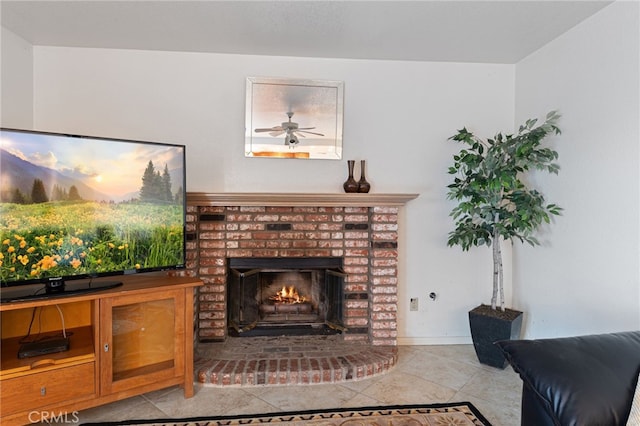 living room featuring ceiling fan, light tile patterned floors, and a brick fireplace