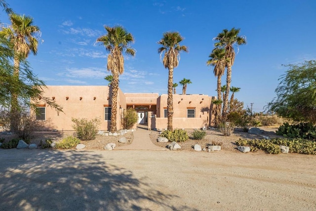 view of adobe home