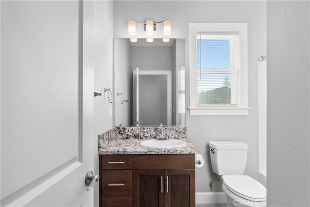 full bathroom featuring independent shower and bath, vanity, and toilet