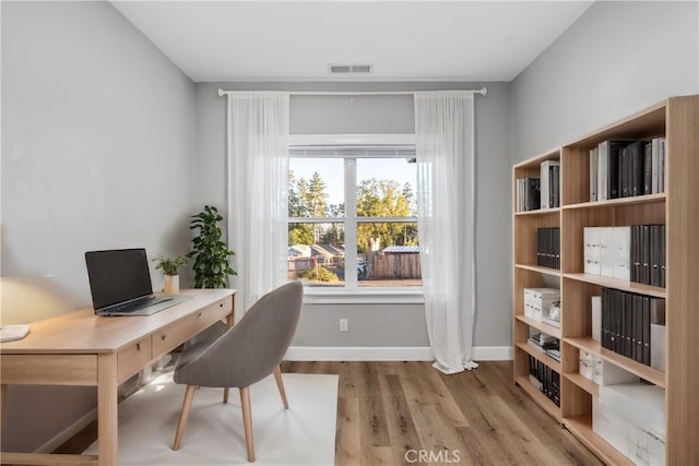 office featuring light hardwood / wood-style floors