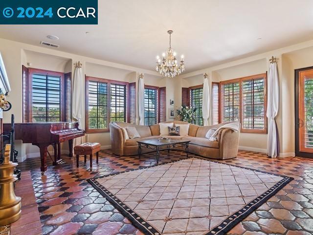 living room with a notable chandelier