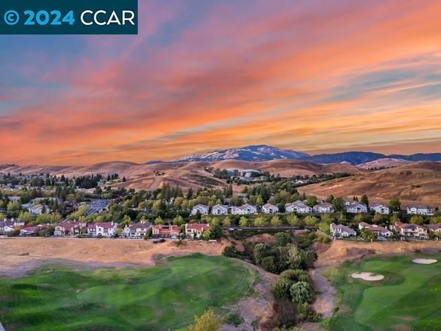 aerial view at dusk with a mountain view