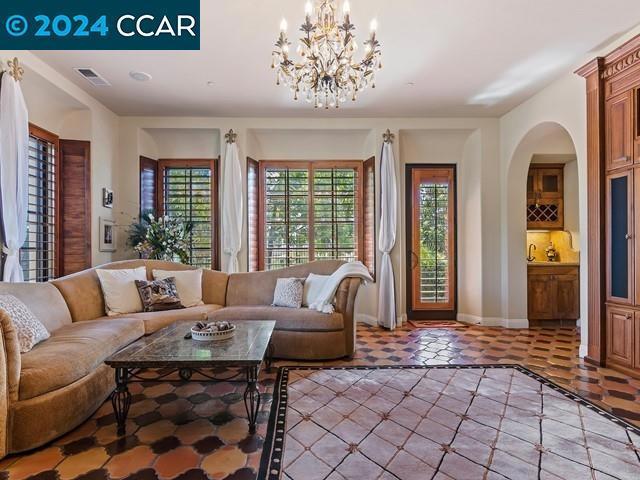 living room with a chandelier