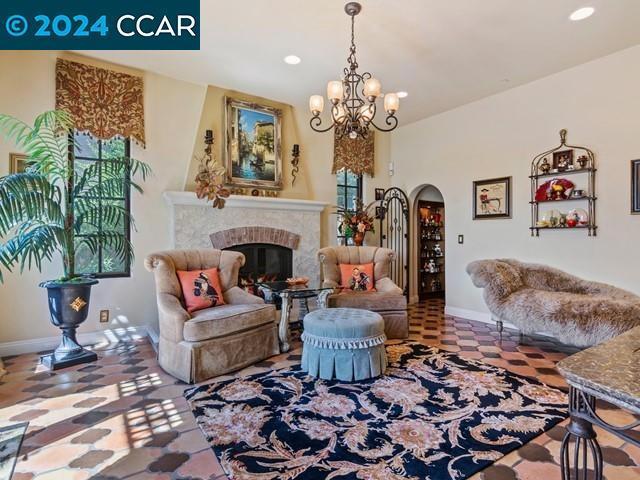 sitting room featuring a chandelier