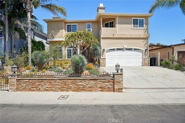 view of front of property featuring a garage