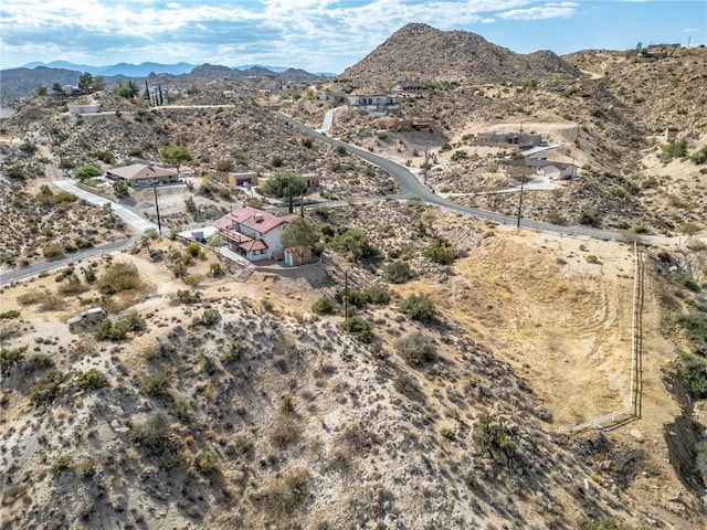 drone / aerial view featuring a mountain view