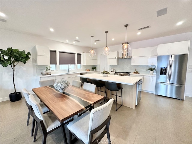 dining space featuring sink