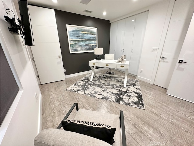 home office featuring light hardwood / wood-style flooring