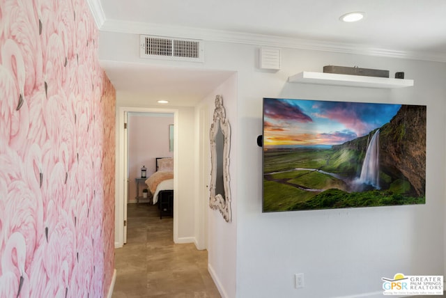 hallway featuring ornamental molding