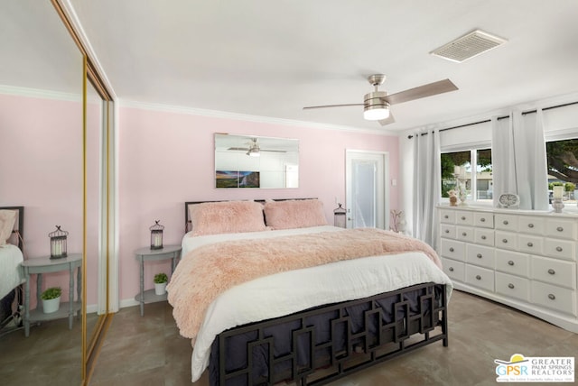 bedroom with ornamental molding and ceiling fan