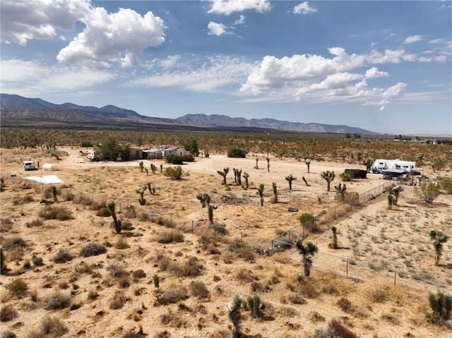 property view of mountains featuring a rural view