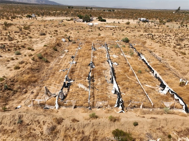 birds eye view of property featuring a rural view