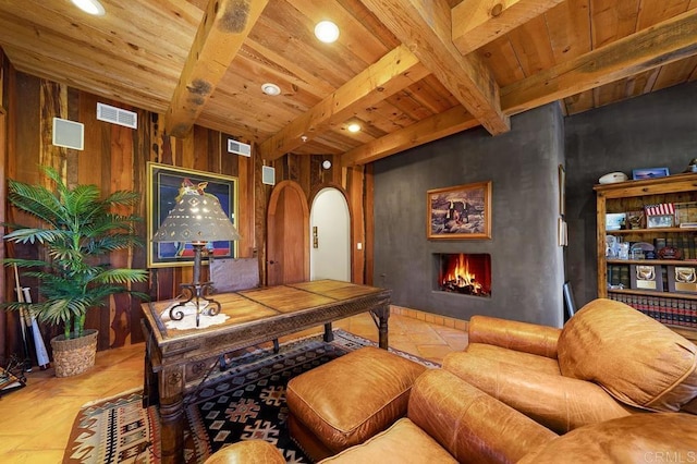 office featuring wooden ceiling, tile patterned floors, beam ceiling, and wood walls