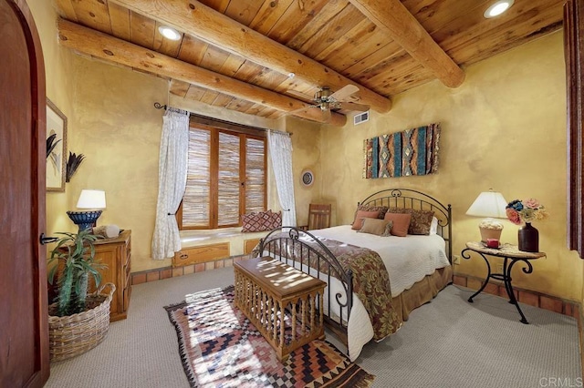 bedroom featuring carpet, ceiling fan, wood ceiling, and beamed ceiling