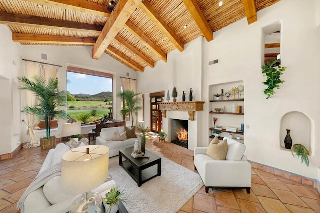 living room featuring wooden ceiling, beam ceiling, and high vaulted ceiling