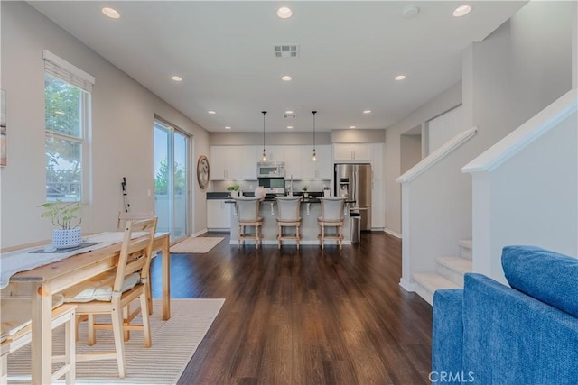 dining room featuring dark hardwood / wood-style floors