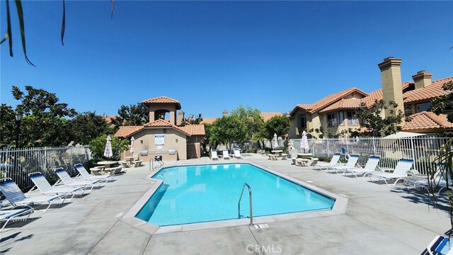 view of pool with a patio area