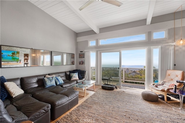 living room featuring hardwood / wood-style flooring, ceiling fan, beamed ceiling, and high vaulted ceiling