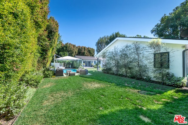 view of yard with a patio area