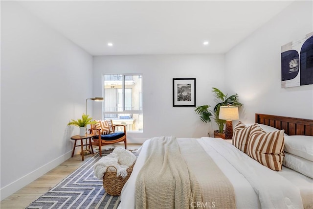 bedroom featuring light hardwood / wood-style flooring