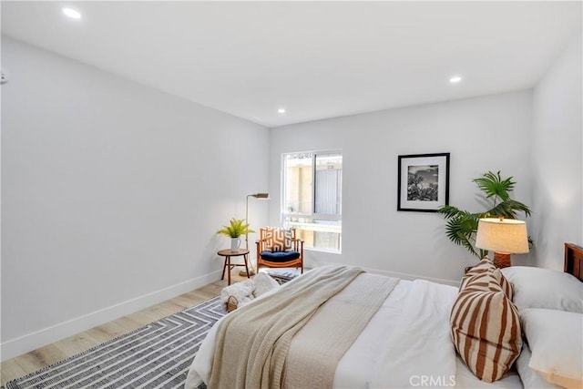 bedroom featuring light wood-type flooring