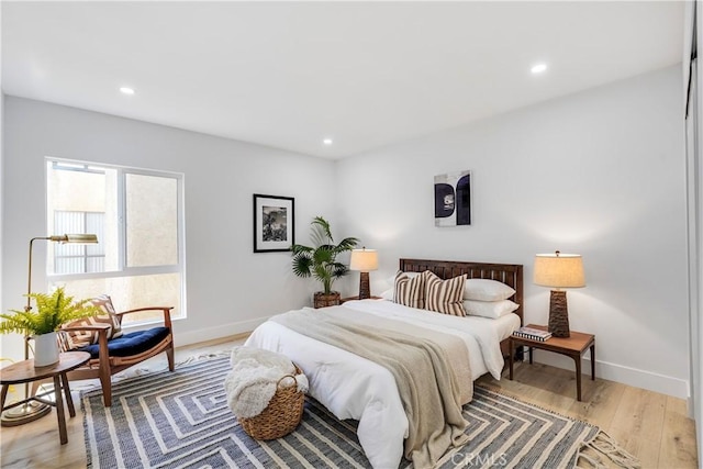 bedroom featuring light wood-type flooring