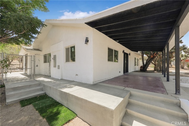 view of home's exterior with a patio area