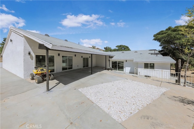 rear view of property with a patio