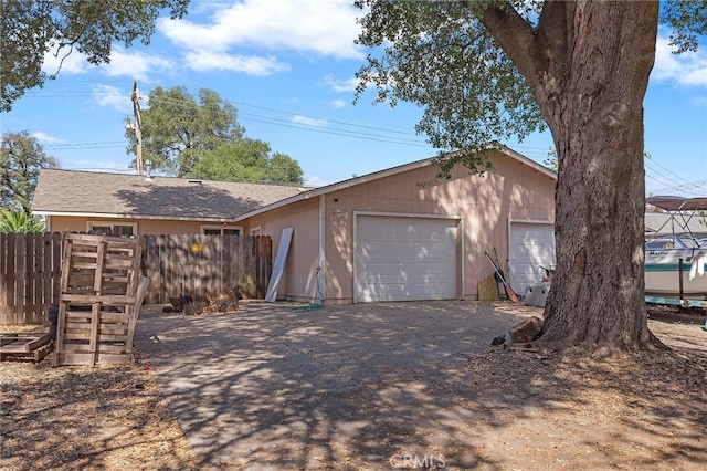 single story home featuring a garage