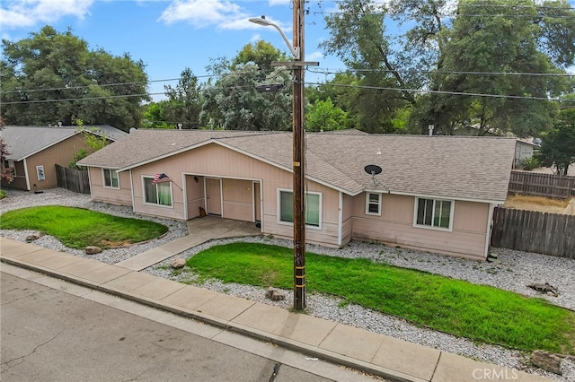 single story home with a front yard