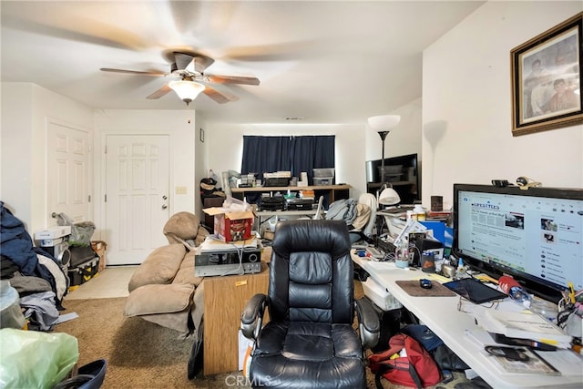 office featuring ceiling fan and light colored carpet