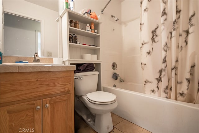 full bathroom featuring vanity, shower / tub combo, toilet, and tile patterned flooring