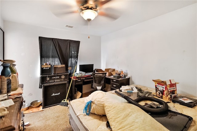 office with ceiling fan and carpet floors