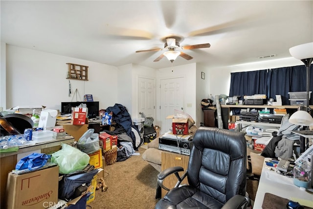 home office featuring carpet and ceiling fan